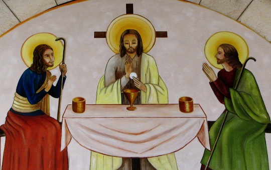 Jesus beim Teilen des Brotes